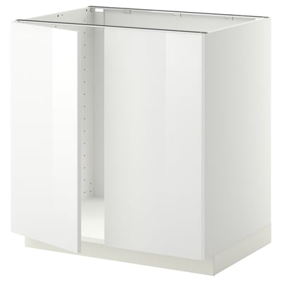 Displays a white METOD kitchen cabinet base, square-shaped, with a smooth, high-gloss finish, designed for built-in appliances.