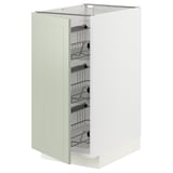 A METOD kitchen cabinet in green with organized interior shelves.