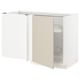 White METOD kitchen unit with beige door and pull-out shelves.