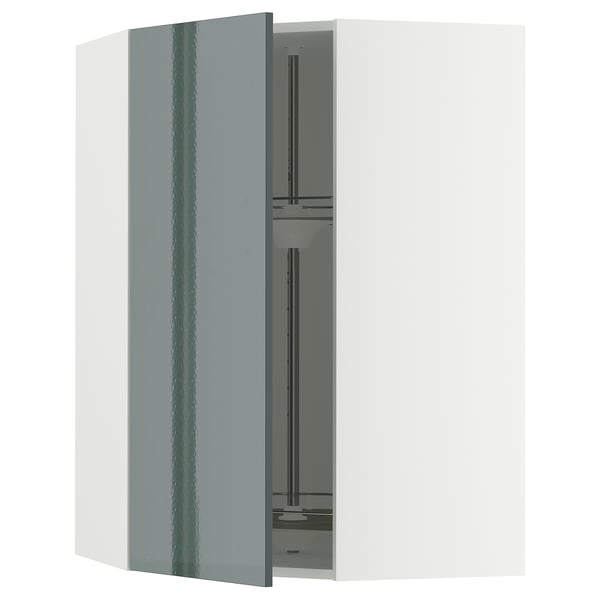 A modern kitchen cabinet from METOD in high-gloss grey-green, featuring a corner carousel for storage.