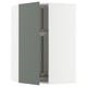 Set of modern grey-green kitchen cabinets with metallic hardware, featuring sleek design and adjustable shelves.