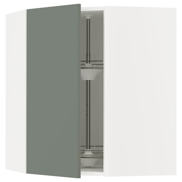 Modular kitchen unit with grey-green door open, showing shelves.