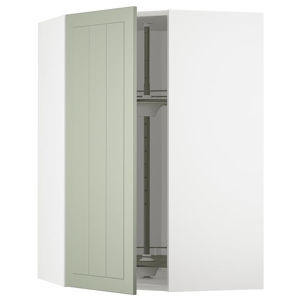 An open off-white METOD kitchen cabinet with green stensund doors and adjustable shelves.