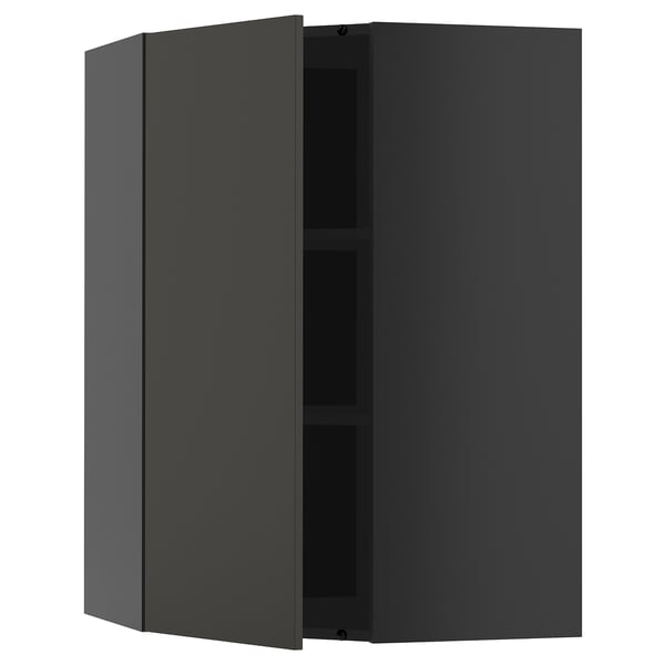 Black METOD wall cabinet with two adjustable shelves and reversible door.