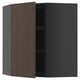 Open dark grey ikea METOD kitchen cabinet with dark wood grain door, showing interior shelves.