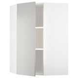 White corner cabinet, part of ikeas METOD kitchen system, featuring light grey havstorp fronts with a sleek, modern design.