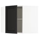 Wall-mounted black-stained kitchen cabinet with beveled door and adjustable shelf.