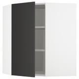 A modern, black kitchen corner cabinet with adjustable shelves and reversible door.
