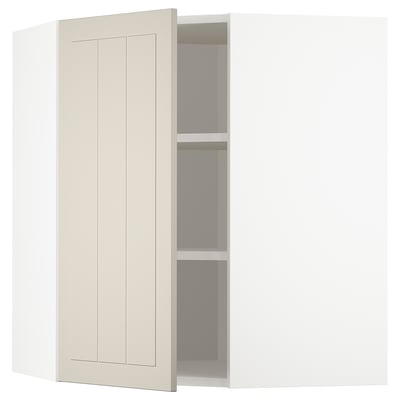 A beige METOD kitchen cabinet with an adjustable shelf.