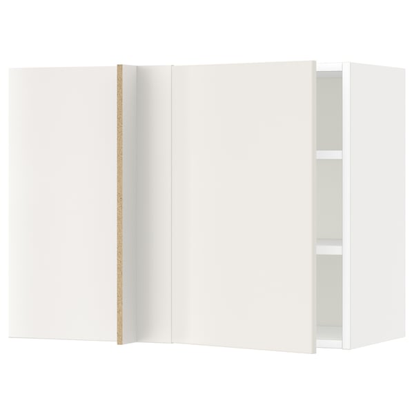 A white ikea METOD wall cabinet with a minimalist design. It has smooth, clean lines and includes a visible interior shelf.