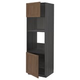 METOD kitchen unit with walnut doors and wire shelves.