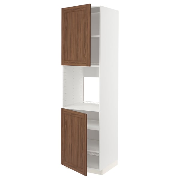 White ikea METOD kitchen cabinet with adjustable shelves and wooden doors, open.