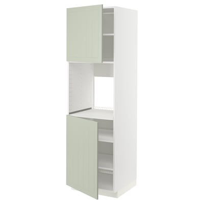 A METOD kitchen cabinet with stensund green doors, showcasing a vertical design with adjustable shelves and a 25-year guarantee.
