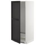 A dark gray lerhyttan cabinet from the METOD kitchen system, featuring a beveled edge design and an open door revealing a wire shelf.