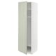 Green METOD kitchen cabinet, tall and narrow with open door.