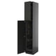 Black METOD tall cabinet with open door revealing shelves, nickel hinges and yellow handle.