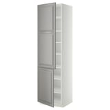 White and gray METOD kitchen cabinet with three shelves.