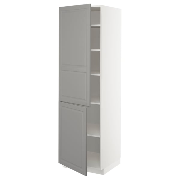A tall white METOD kitchen cabinet with light grey doors and shelves. It has a classic design with adjustable shelves and bevelled edges on the doors.