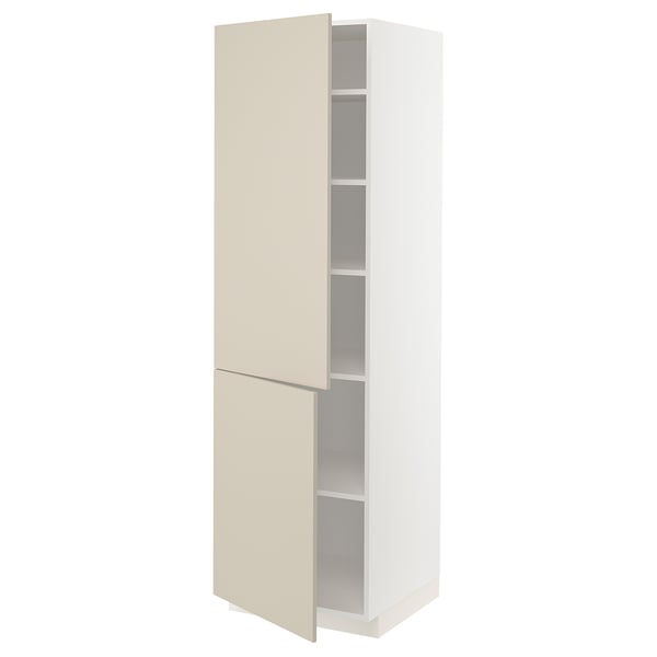 A white METOD kitchen cabinet with beige doors and shelves. The cabinet has a modern, smooth design with adjustable inner shelves.