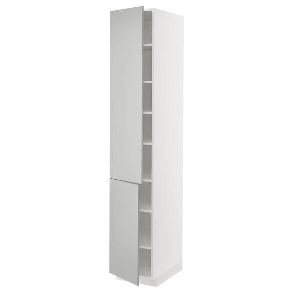 White tall cabinet, part of the METOD kitchen system, featuring multiple shelves and two doors. Modern, clean design with light grey finish.