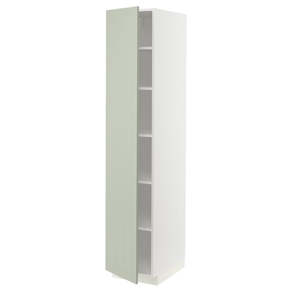 Ikea METOD green kitchen cabinet, tall and slim, white interior with adjustable shelf.