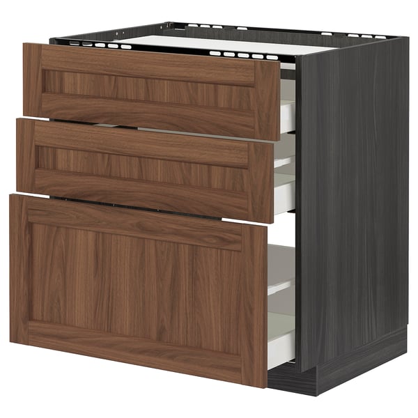METOD kitchen unit in walnut finish with three drawers and sleek wooden handles.