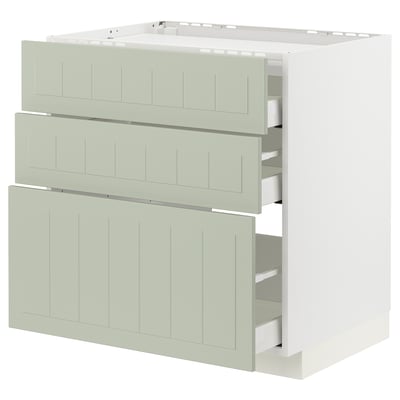 Ikea METOD kitchen unit with three green drawers, sturdy white base, smooth drawer fronts.