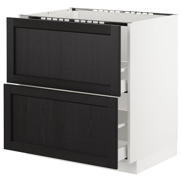 A METOD kitchen cabinet with black stained lerhyttan drawer fronts featuring beveled edges, framed in white.