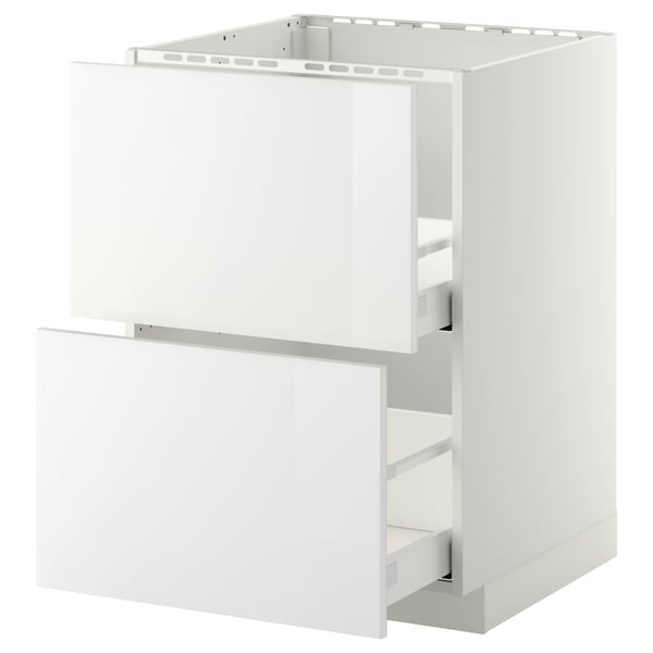 A white METOD kitchen base cabinet with a partially open drawer, designed for a built-in oven or sink. It a modern, high-gloss finish.