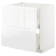 This image shows a white METOD kitchen cabinet with a sleek, modern design. The cabinet integrated handles and has a sturdy frame construction.