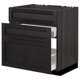 Black stained kitchen cabinet with beveled drawer fronts and two pull-out drawers.