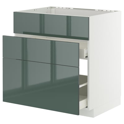 Modern kitchen unit, grey-green high-gloss drawer fronts, self-closing drawers, white frame.