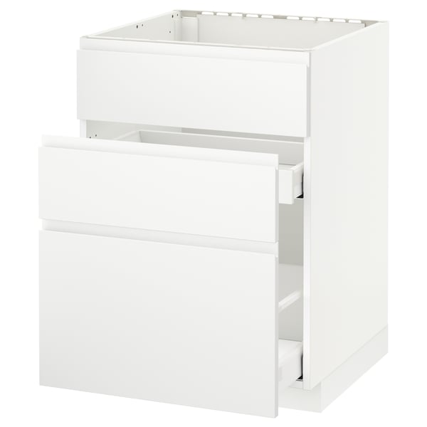 This image shows a white METOD kitchen cabinet with a smooth, minimalist design, featuring multiple drawers and a sleek handle-less front.