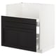 METOD black & white kitchen cabinet with dark stained wood drawer, modern design.