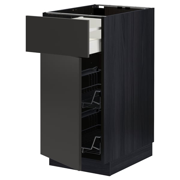 A black METOD kitchen cabinet with a drawer and shelves.