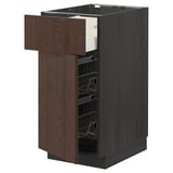 A dark brown ikea METOD kitchen cabinet with a pull-out drawer and wire basket storage. The cabinet a wooden front with a sleek, modern design.