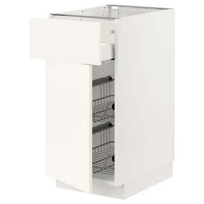 White METOD kitchen cabinet with drawers and shelves.