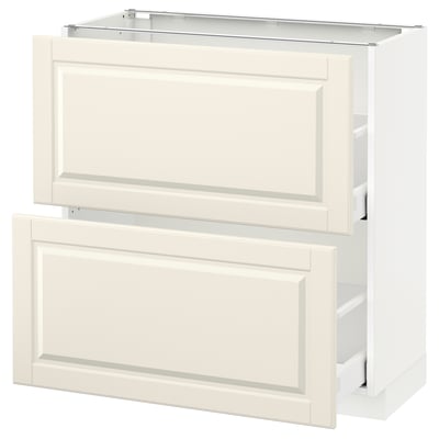White kitchen cabinet with drawers, off-white color, rectangular shape, and classic design.