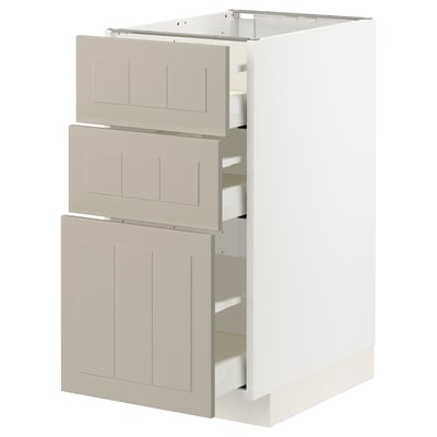 A beige ikea METOD kitchen cabinet with three drawers. The cabinet has a rectangular shape with flat panel design.