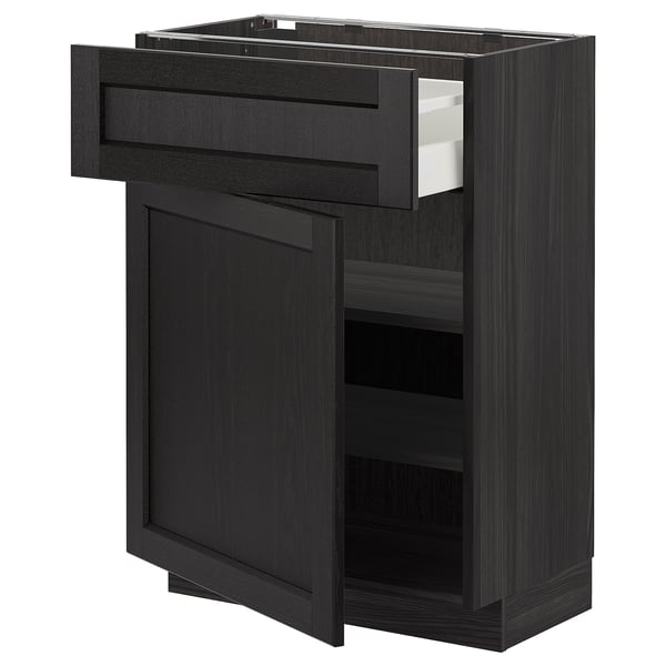 Black stained wooden kitchen cabinet with pull-out shelf and drawer, traditional design.