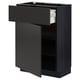 A dark grey METOD kitchen cabinet with a partially open drawer, featuring a sleek black finish and modern design.
