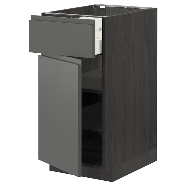 Dark grey METOD kitchen unit with drawer and shelves, modern design.