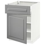 White METOD kitchen cabinet with gray drawer and door, beveled edges.