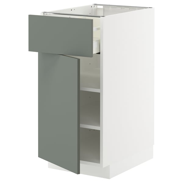Modern kitchen cabinet, white with grey-green drawer, adjustable shelves, sleek design.