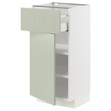 A modern METOD kitchen unit in green. It has a cabinet with adjust shelves, a smooth drawer, and damper hinges.