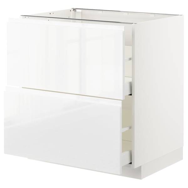 White METOD kitchen cabinet with smooth, high-gloss finish and three drawers.