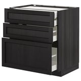 Black stained black kitchen cabinet with beveled drawers.
