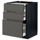 This image shows a modern dark grey kitchen cabinet with three drawers and a pull-out work surface from the ikea METOD system.