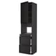 An ikea METOD kitchen unit in black with drawers and open cabinets.