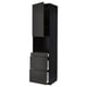 Black kitchen unit: tall, modern, with drawers, cupboard doors, metal handles.